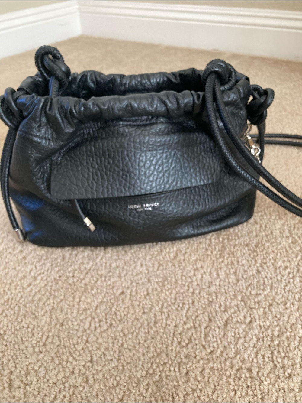 henri bendel Black Pebbled Leather Drawstring Crossbody Bag